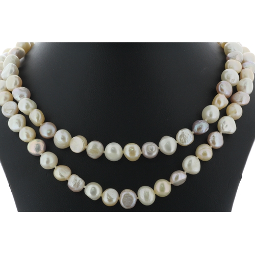 136 - Baroque Shaped Freshwater Cultured 8.0 - 8.5mm Pearl Necklace. Pearl Quality AAA. This necklace is 3... 