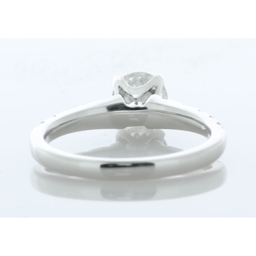 17 - A modern classic style diamond engagement ring with a lively natural round brilliant cut diamond 0.7... 