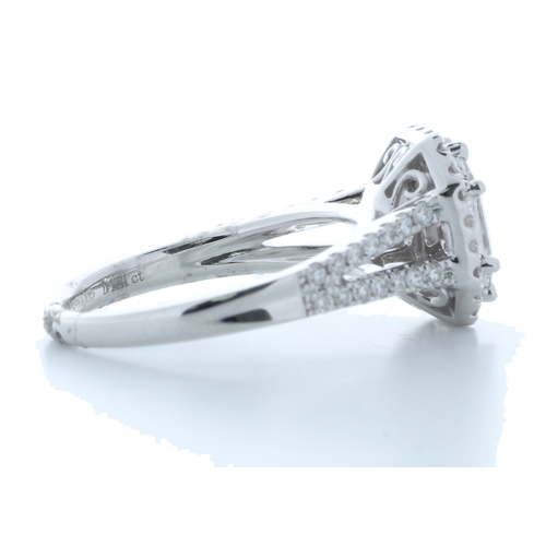 19 - A wonderfully handcrafted diamond engagement ring with a lively natural emerald cut diamond set in t... 