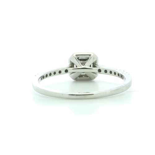 20 - A sparkling natural princess cut diamond is surrounded by a halo of sixteen round brilliant cut diam... 