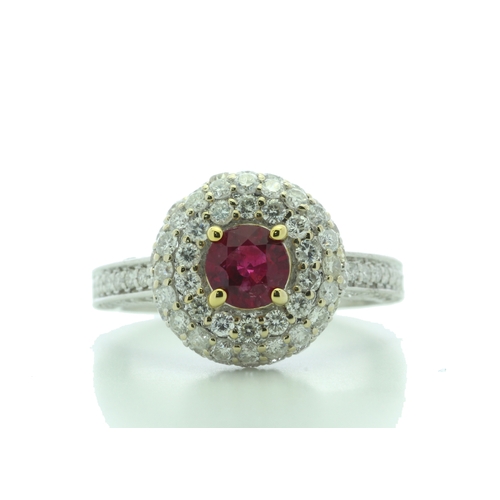 34 - A gorgeous ruby is nestled in a triple halo of sixty two diamonds and fifty eight diamonds on the in... 