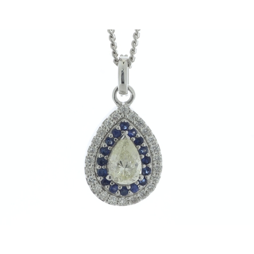 39 - A pear shape diamond sits in a double halo of sapphires and round brilliant cut diamonds to create t... 