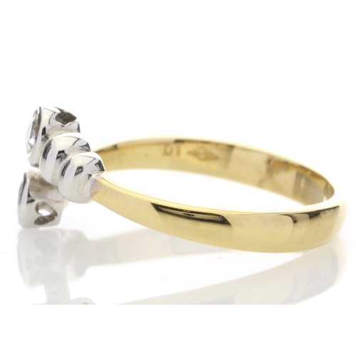 4 - Two round brilliant cut diamonds are set in this unique 18ct yellow gold fancy dress ring. Ring size... 