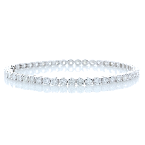 42 - Fifty eight round brilliant cut diamonds are set in this stunning 18ct white gold tennis bracelet. 8... 