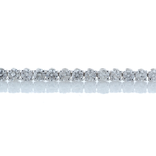 42 - Fifty eight round brilliant cut diamonds are set in this stunning 18ct white gold tennis bracelet. 8... 