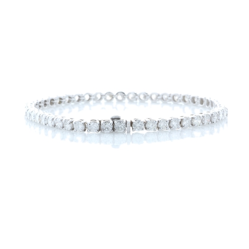 42 - Fifty eight round brilliant cut diamonds are set in this stunning 18ct white gold tennis bracelet. 8... 