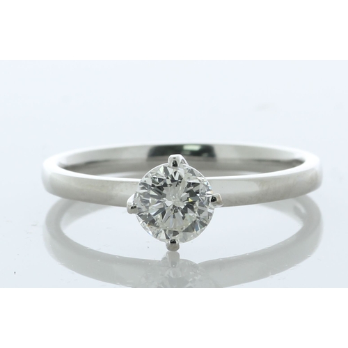 46 - A 0.74 carat diamond set in a platinum twist top claw setting. This diamond ring would make a stunni... 