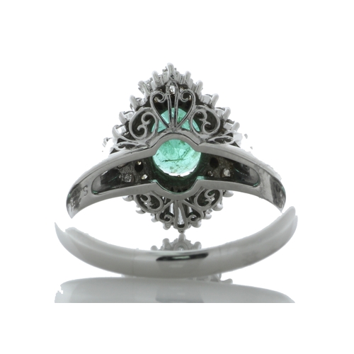 53 - One oval emerald is surrounded by a cluster of various cuts diamonds on the marquise shaped halo. Ri... 