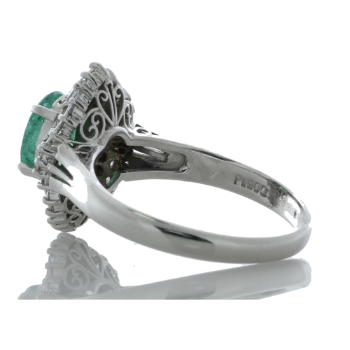 53 - One oval emerald is surrounded by a cluster of various cuts diamonds on the marquise shaped halo. Ri... 