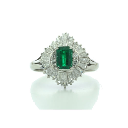 54 - One emerald shaped emerald is surrounded by a marquise shaped cluster of mixed cut diamonds. Ring si... 