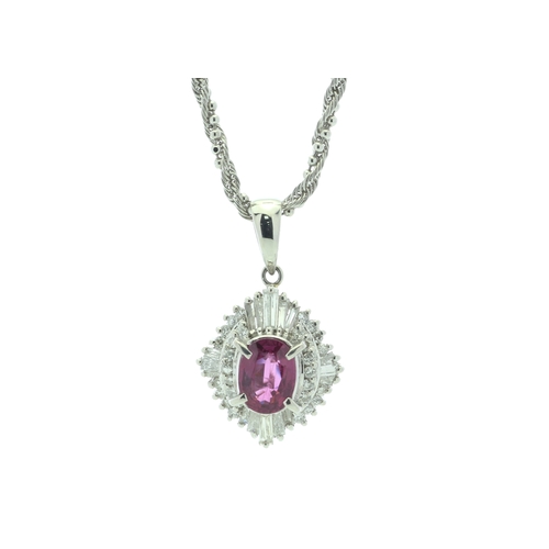 59 - One oval ruby is surrounded by a marquise shaped cluster of mixed cut diamonds are set in this gorge... 