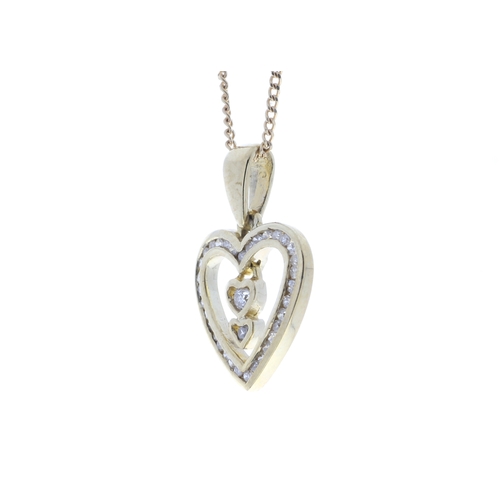 70 - Two natural round brilliant cut diamond is set in the centre of this gorgeous 9ct yellow gold heart ... 