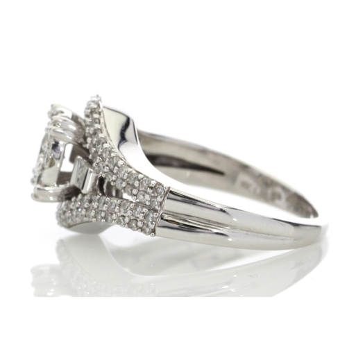 74 - This stunning cluster set 9ct white gold ring is set with a total diamond weight of 1.00 carat. It i... 