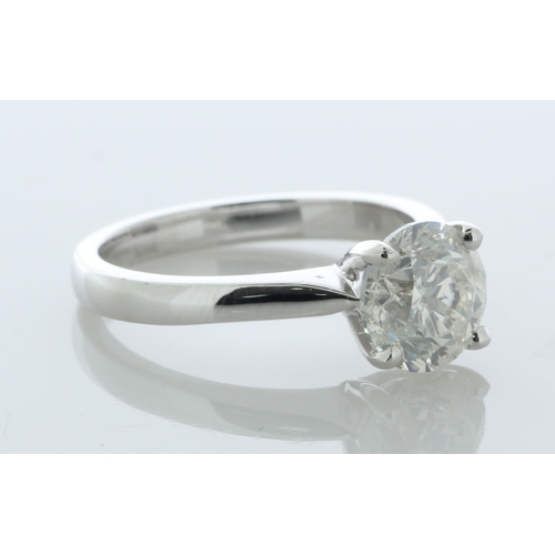 8 - A massive 1.98 carat diamond set in an 18ct white gold gallery setting. This diamond ring would make... 