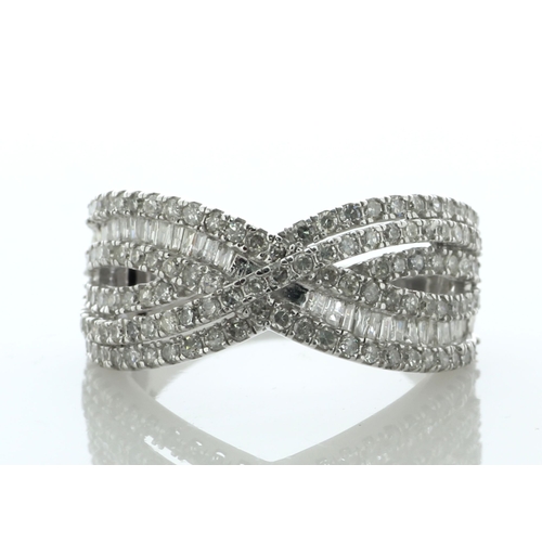 88 - Shimmering with multiple baguette cut diamonds and multiple single cut diamonds, this 9ct white gold... 