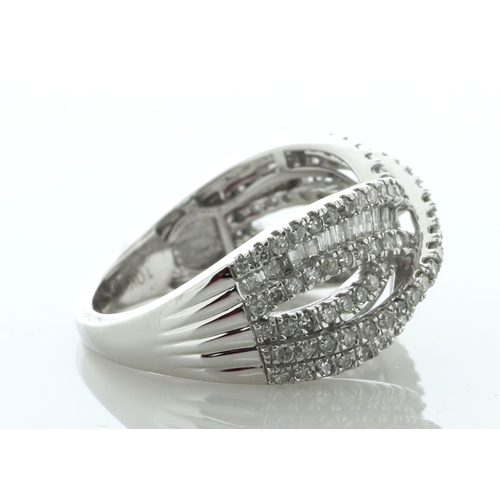 88 - Shimmering with multiple baguette cut diamonds and multiple single cut diamonds, this 9ct white gold... 