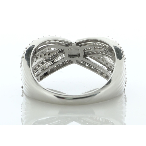 88 - Shimmering with multiple baguette cut diamonds and multiple single cut diamonds, this 9ct white gold... 