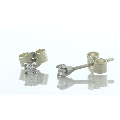 89 - Two round brilliant cut diamonds are set in these classis 9ct white gold stud earrings. Item Specifi... 