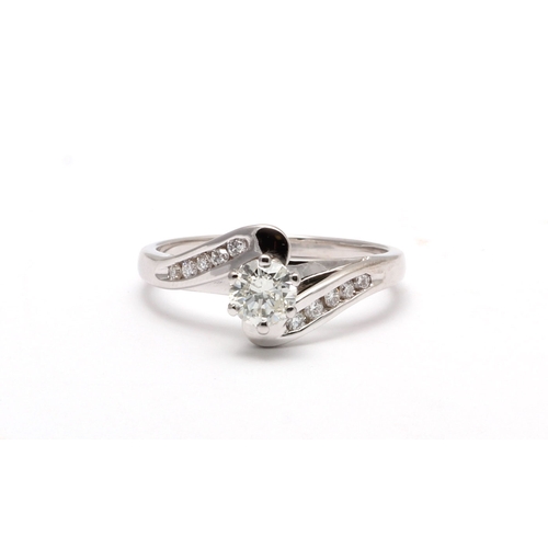 9 - One sparkling round brilliant cut diamond 0.51 carats is set in an 18ct classic white gold ring. Thi... 