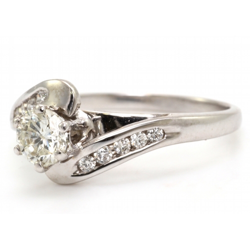 9 - One sparkling round brilliant cut diamond 0.51 carats is set in an 18ct classic white gold ring. Thi... 