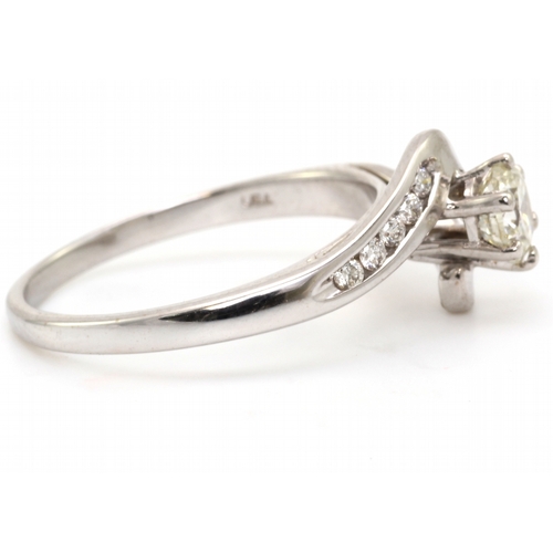 9 - One sparkling round brilliant cut diamond 0.51 carats is set in an 18ct classic white gold ring. Thi... 