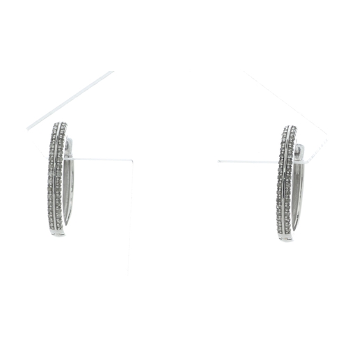 91 - These gorgeous 10ct white gold diamond hoop earrings are semi set with two rows of round diamonds. T... 