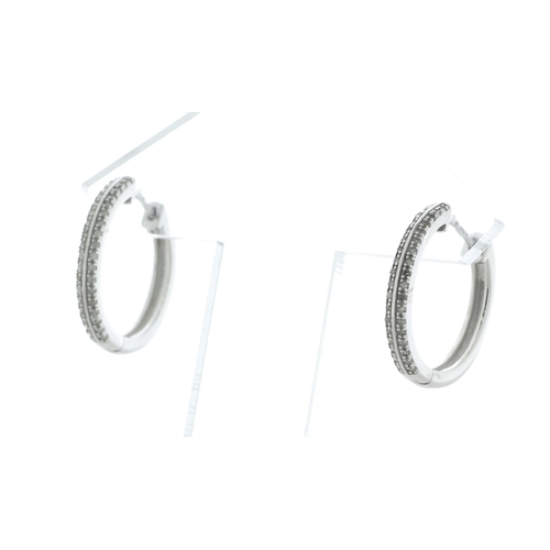 91 - These gorgeous 10ct white gold diamond hoop earrings are semi set with two rows of round diamonds. T... 