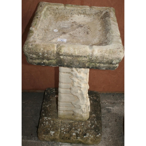 43 - A STONE BIRD BATH ON PEDESTAL STAND