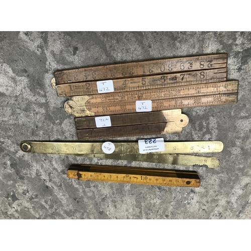 223 - FIVE VINTAGE SLIDE RULES TO INCLUDE FOUR WOODEN AND ONE BRASS EXAMPLE