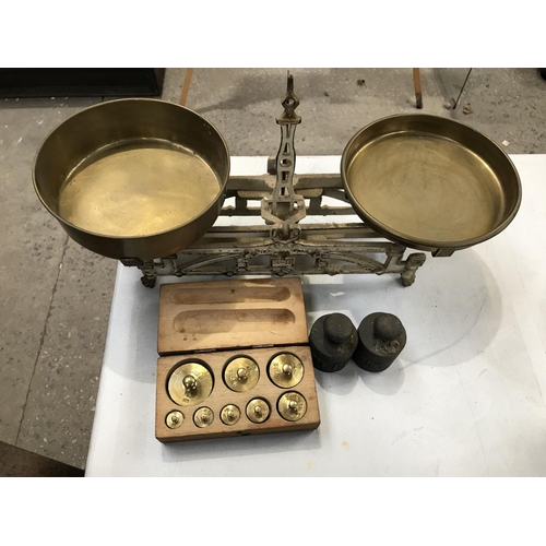 226 - A SET OF CAST WAG SCALES WITH BRASS PANS, A WOODEN CASED SET OF EIGHT FLAT BRASS WEIGHTS AND TWO FUR... 