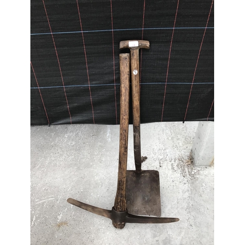 14 - A VINTAGE PICKAXE AND SHOVEL