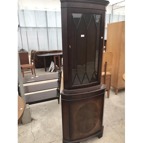 614 - A MAHOGANY CORNER CABINET WITH LOWER DOOR AND UPPER GLAZED DOOR