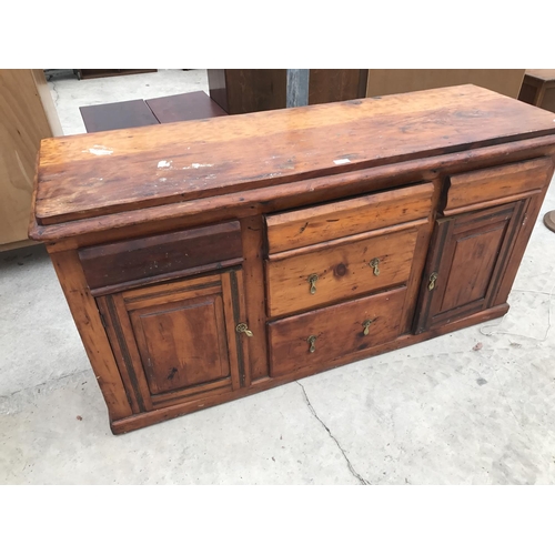 616 - A PINE SIDEBOARD WITH FIVE DRAWERS AND TWO DOORS