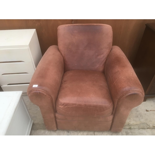 670 - A BROWN LEATHER ARMCHAIR