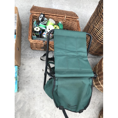 13 - A WICKER BASKET, A SHAKESPEARE FISHING STOOL/ TACKLE BAG AND A LARGE QUANTITY OF FISHING LINE ON SPO... 