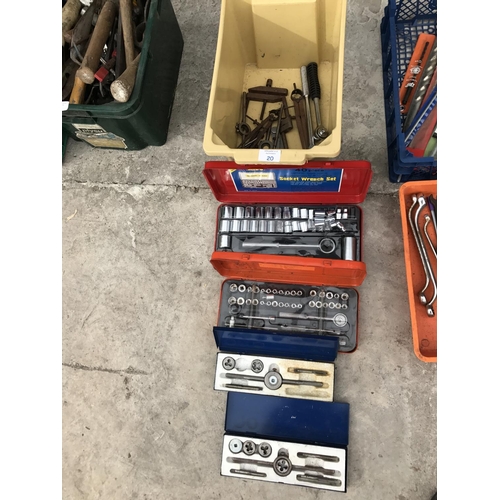 20 - A BOX CONTAINING DIE WRENCHES, RATCHETS, TWO SMALL GAUGE SOCKET SETS AND TWO PART TAP AND DIE SETS