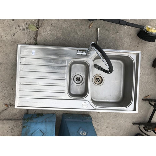 52 - A FRANKE STAINLESS STEEL DOUBLE DRAINER SINK WITH HOSE TAP