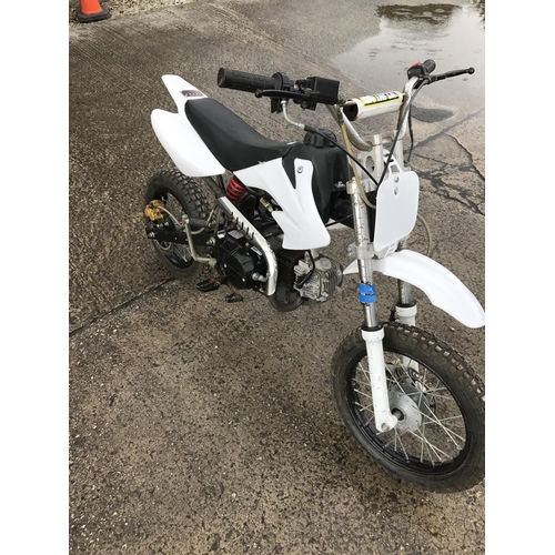 63 - A CHILD'S 110 CC MOTORCROSS BIKE WITH FOUR GEARS - W/O