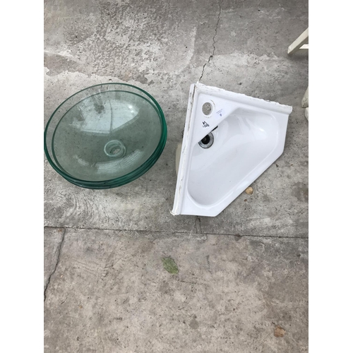 9 - TWO GREEN TINTED GLASS WASH BASINS AND A CORNER BASIN