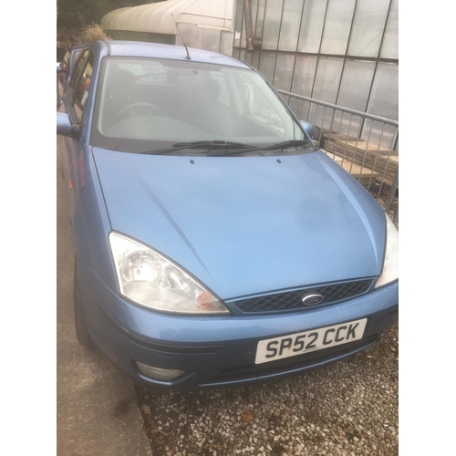 71 - A BLUE FORD FOCUS GHIA CAR, 2002 YEAR OF MANUFACTURE