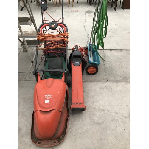 26 - FOUR ITEMS - TWO ELECTRIC MOWERS. A FLYMO HOVER AND A QUALCAST ROTARY, A FLYMO GARDEN VAC AND A GARD... 