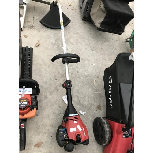 34 - A HOMELITE PETROL STRIMMER