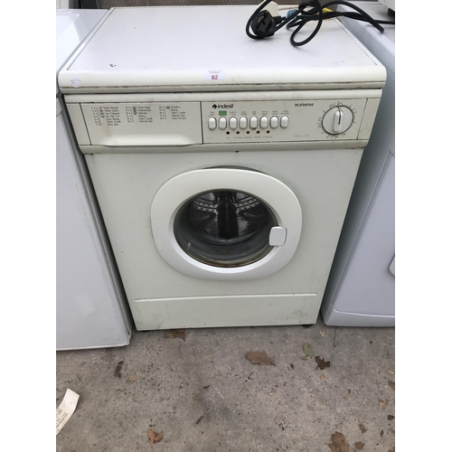 82 - AN INDESIT OMEGA 1100 ECOSENSE WASHING MACHINE W/O