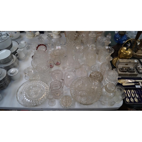 388 - A LARGE QUANTITY OF ASSORTED PRESSED AND CUT GLASSWARE (QTY)