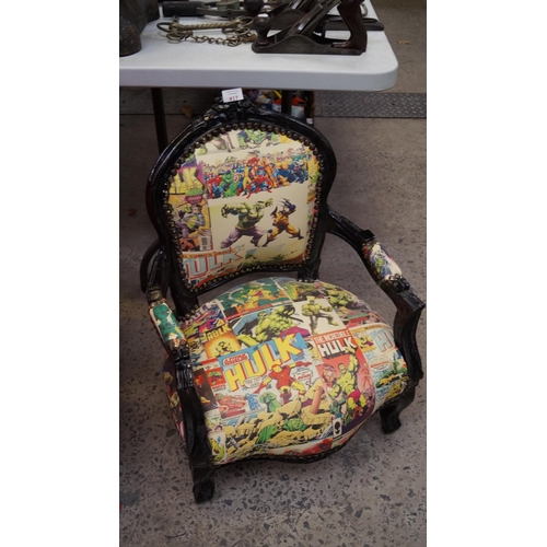 417 - A CHILD'S MODERN ARMCHAIR WITH STYLISH MARVEL COMIC UPHOLSTERY 72CM HIGH