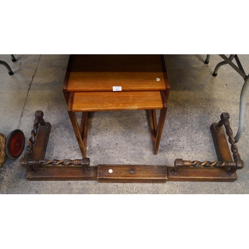 451 - A NEST OF TWO RETRO TEAK TABLES TOGETHER WITH A WOODEN FENDER WITH TWIST SUPPORTS (3)