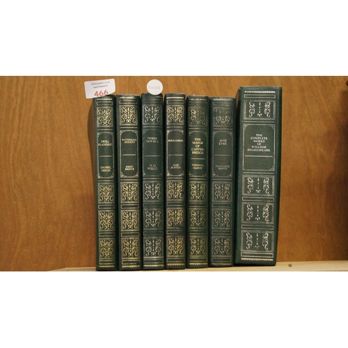 466 - SEVEN VARIOUS GREEN LEATHER BOUND BOOKS TO INCLUDE 'THE COMPLETE WORKS OF WILLIAM SHAKESPEARE' ETC (... 