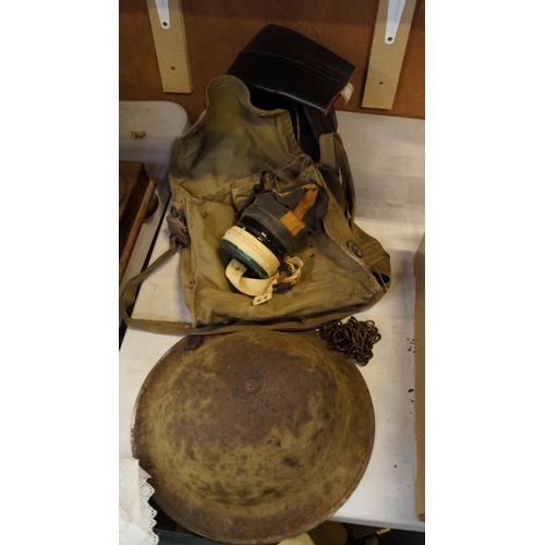 470 - A MIXED PAIR OF VINTAGE WWII ITEMS TO INCLUDE A PAIR OF LEATHER BOOTS, GAS MASK & METAL HELMET (3)