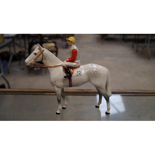 500 - A BESWICK MODEL OF A HORSE AND JOCKEY, No1862, IN THE RARE DAPPLE GREY COLOURWAY, DESIGNED BY ARTHUR... 