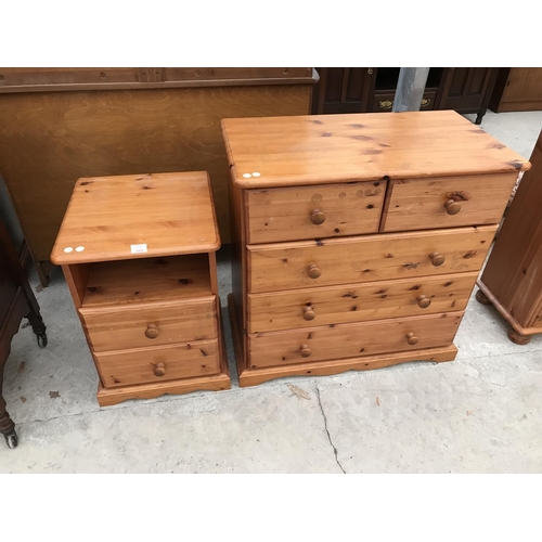 949 - A PINE BEDSIDE CABINET AND A PINE CHEST OF TWO SHORT AND THREE LONG DRAWERS